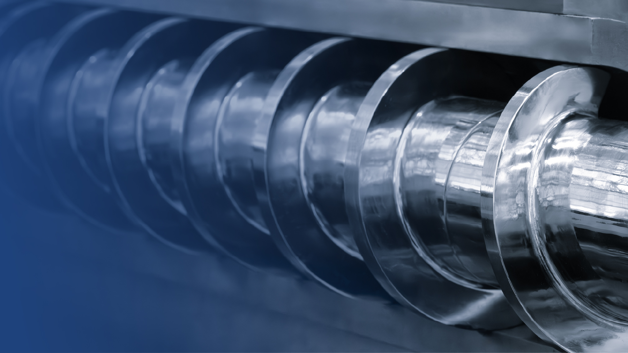 Close-up of a stainless steel screw conveyor's flighting