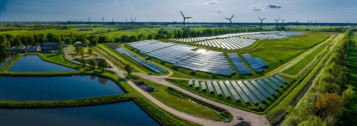Solar farm and wind turbines producing alternative energy