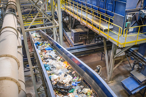 Recycling sorting conveyor at a material recovery facility